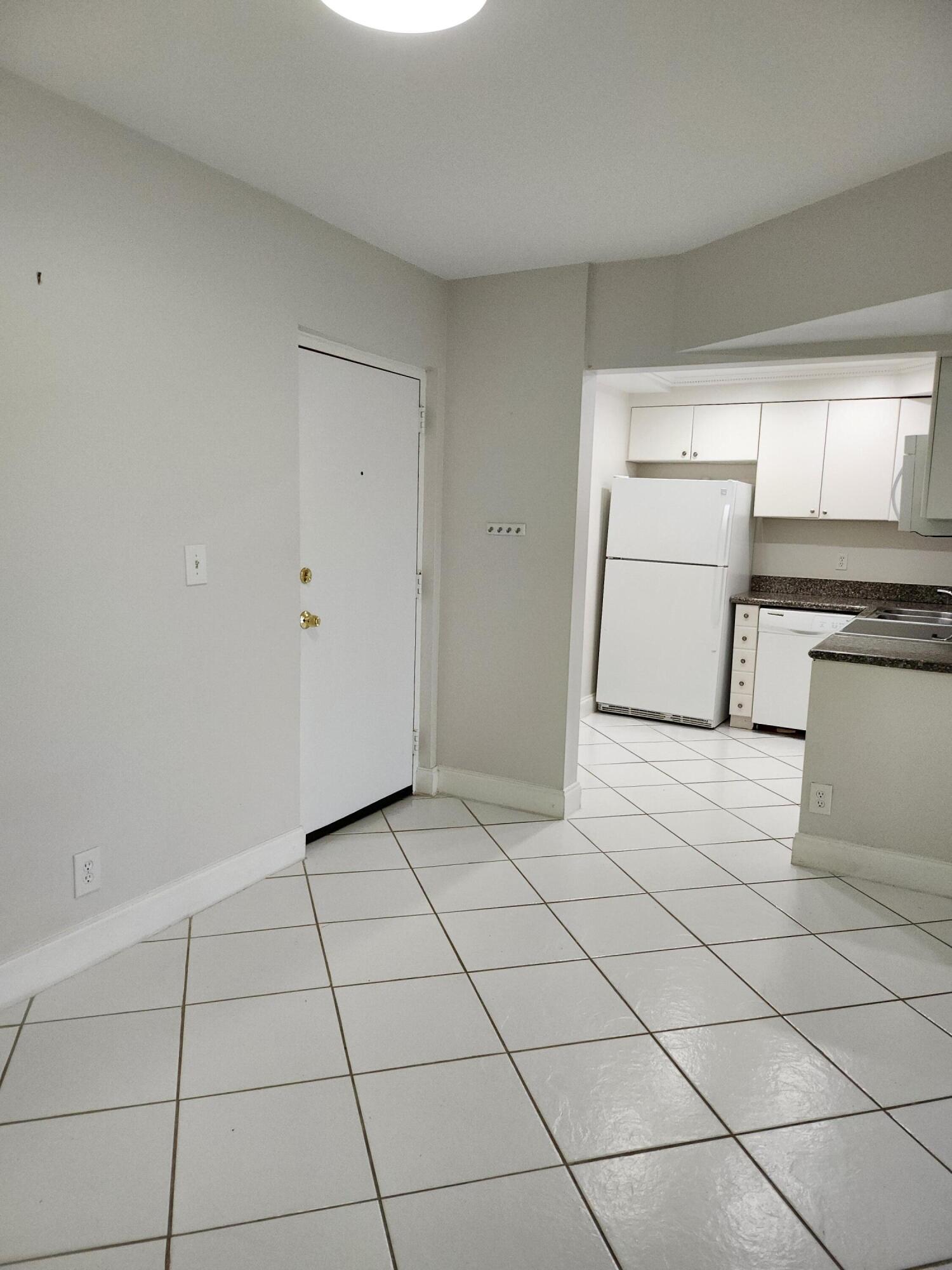 450 Northwest 20th Street, Unit 3040 Boca Raton, FL 33431 - Photo 9 of 34 Entrance to Condo Unit Interior