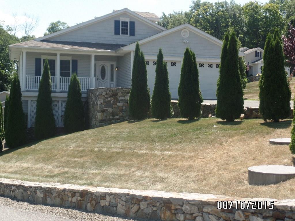 60 Silver Ridge Lane, Unit 13 Naugatuck, CT 06770 - Photo 1 of 1 a view of a house with backyard