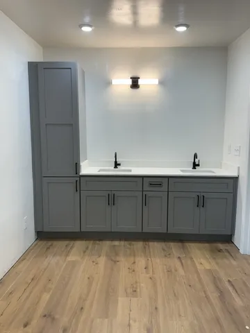 a kitchen with a cabinets and window