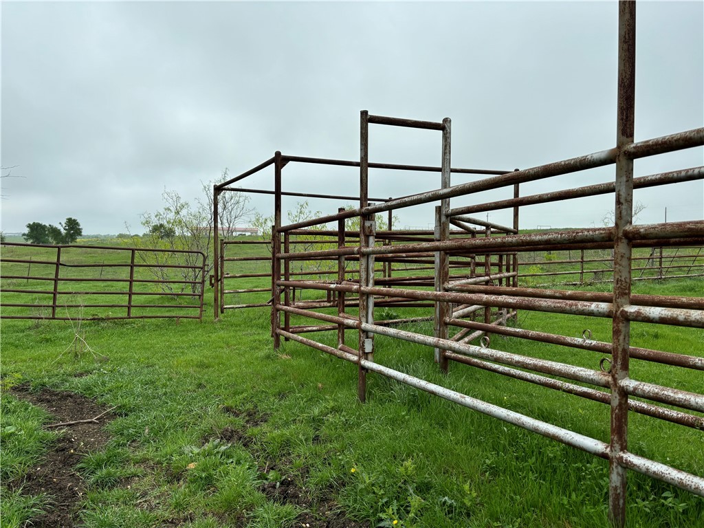 1716 B County Road 469 Coupland, TX 78615 - Photo 13 of 27 View of yard with an exterior structure, a rural view, and an outdoor structure