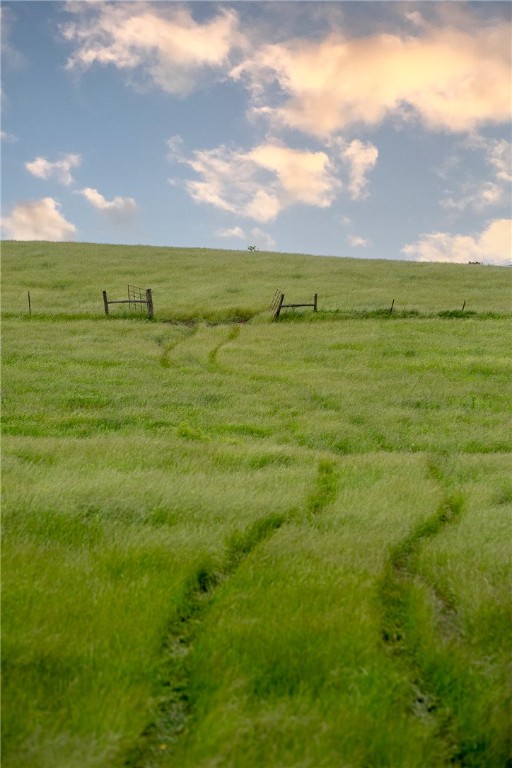 1716 B County Road 469 Coupland, TX 78615 - Photo 23 of 27 View of yard with a rural view