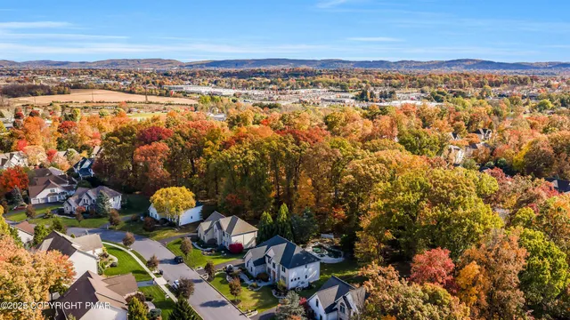 a workspace with furniture and a flat screen tv