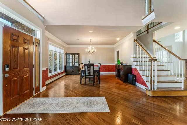 a bedroom with a bed and flat screen tv