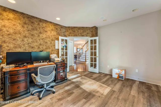 a bathroom with a toilet sink and shower
