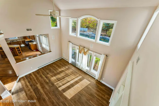 a bathroom with a bathtub and shower