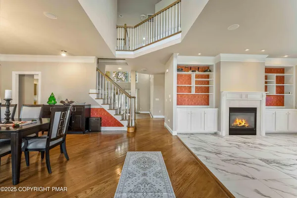 a open kitchen with stainless steel appliances granite countertop a sink refrigerator and cabinets