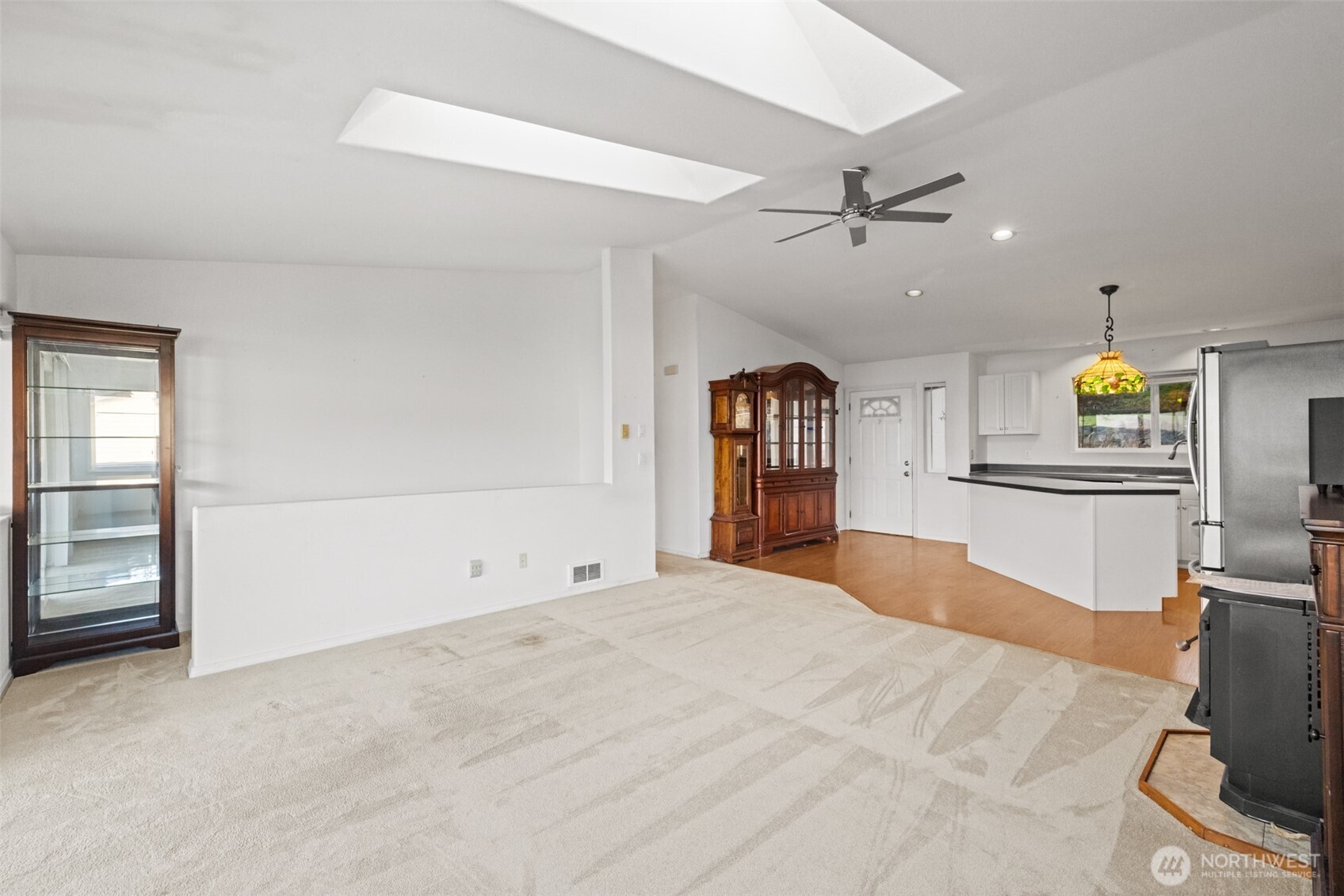 233 Lupine Drive Sequim, WA 98382 - Photo 14 of 40 a view of a kitchen with a sink and a window