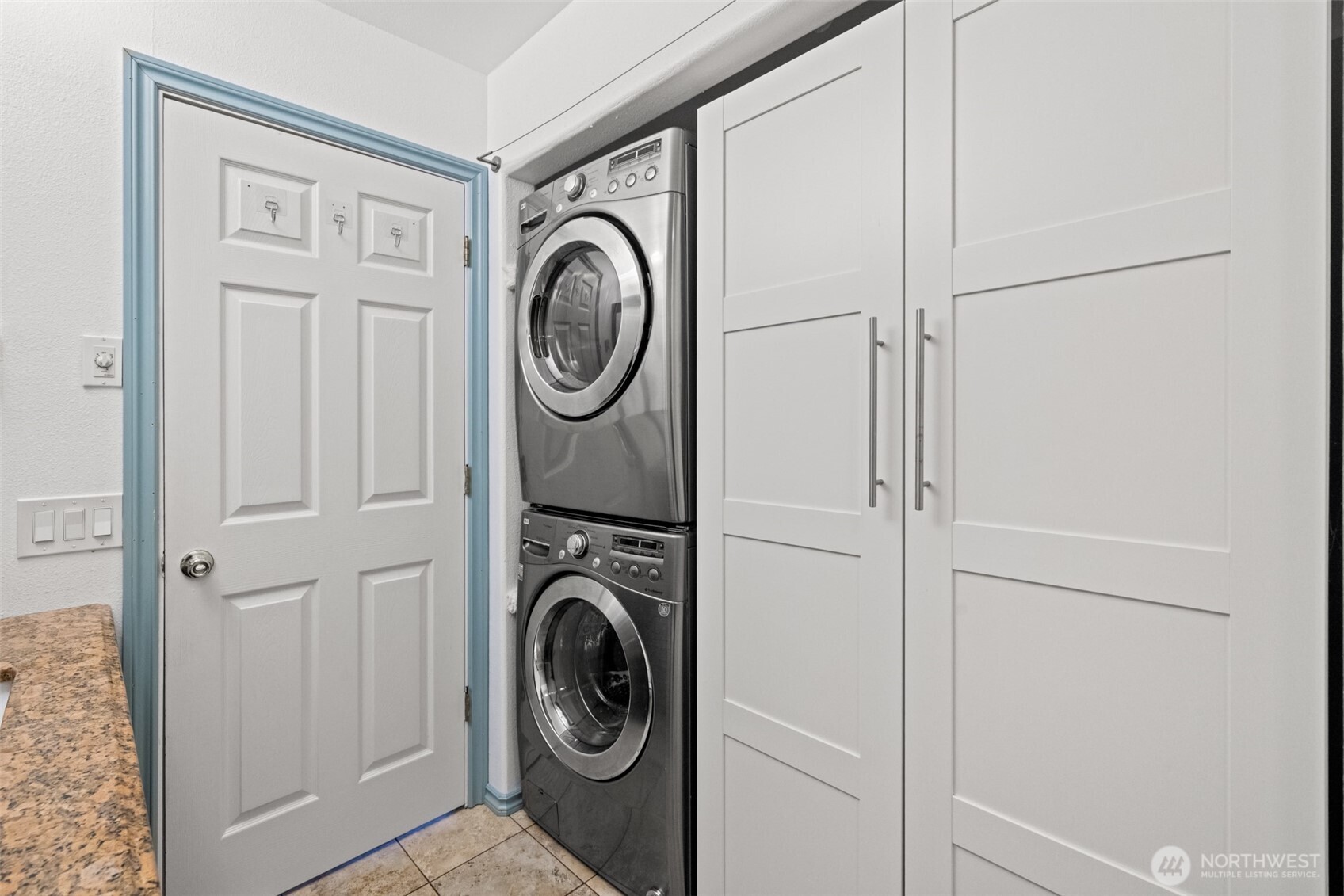 233 Lupine Drive Sequim, WA 98382 - Photo 27 of 40 a view of a hallway with washer and dryer