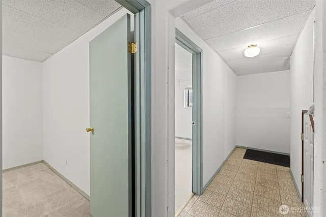 a view of a bathroom with a glass door