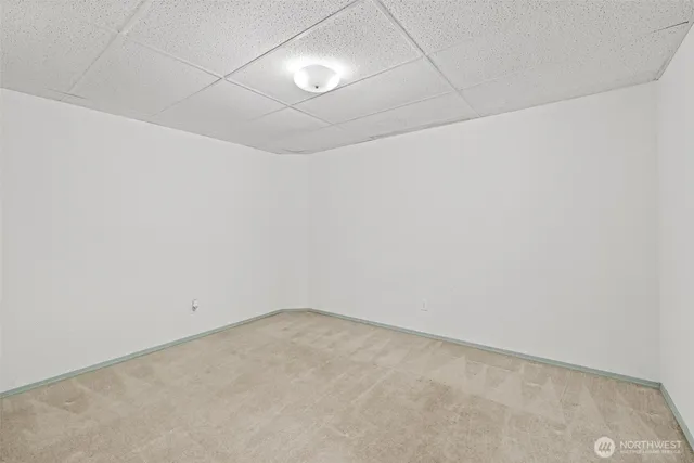 an empty room with a bench