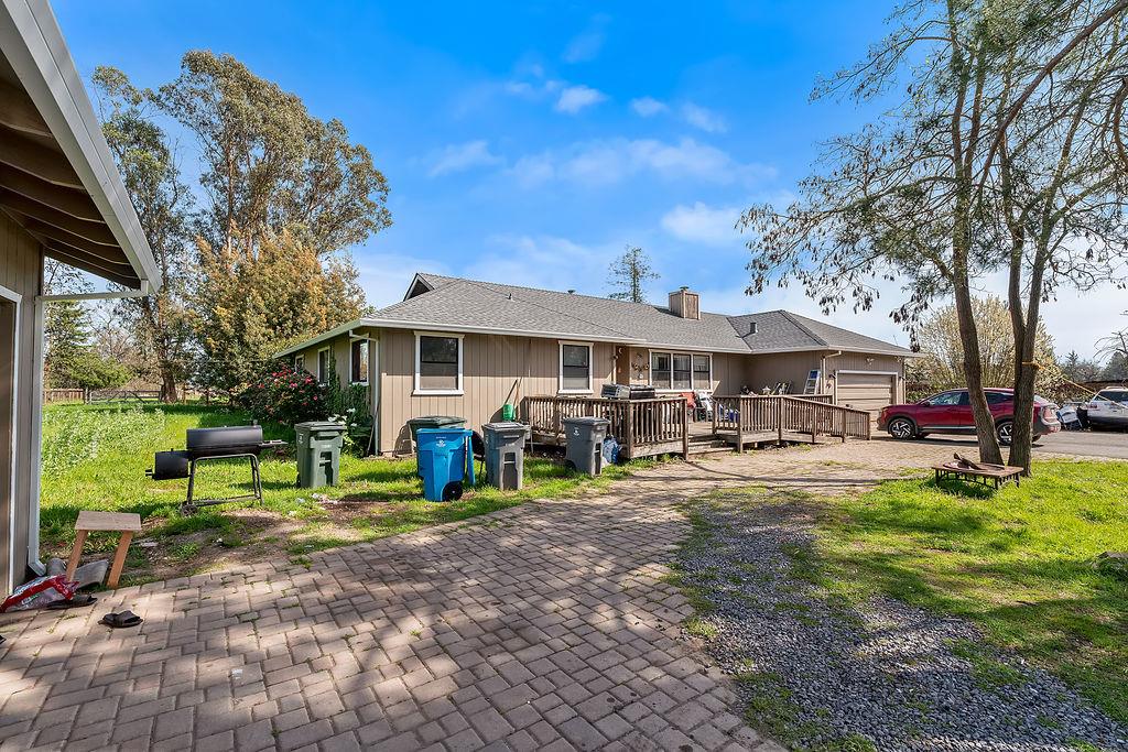 Irwin Lane Santa Rosa, CA 95401 - Photo 15 of 35 a view of a house with garden and sitting area