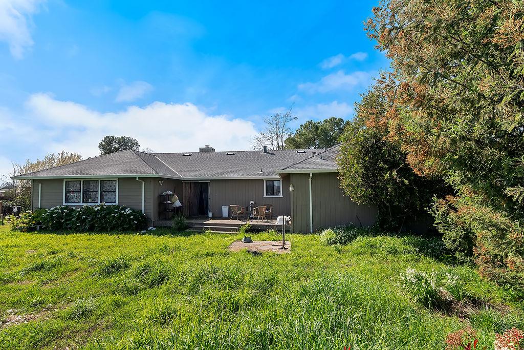 Irwin Lane Santa Rosa, CA 95401 - Photo 19 of 35 a view of a house with a yard and sitting area