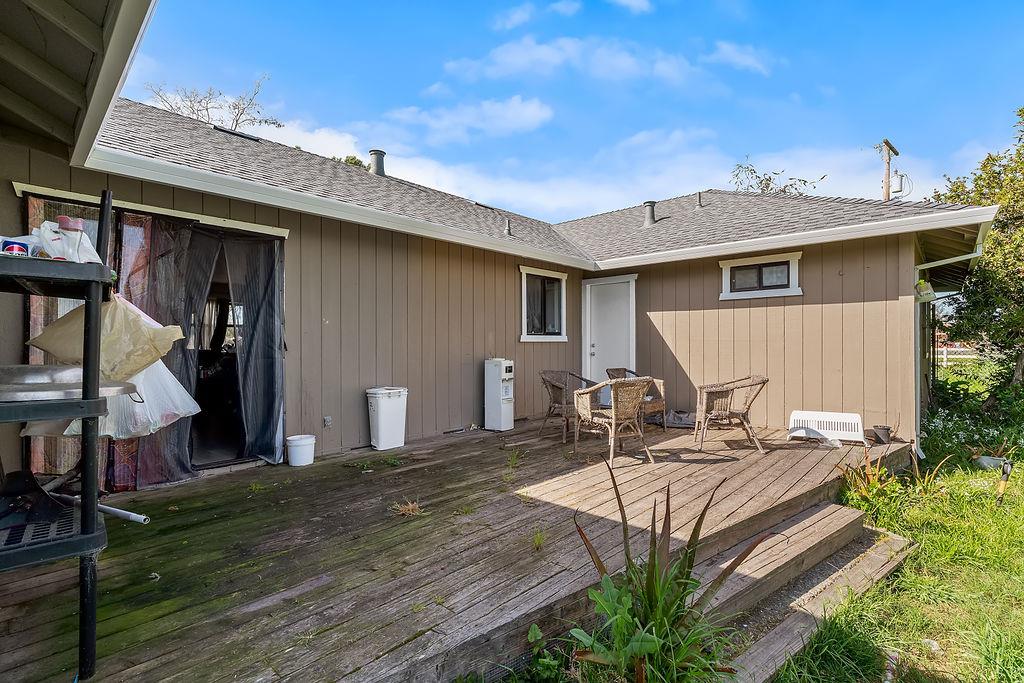 Irwin Lane Santa Rosa, CA 95401 - Photo 22 of 35 a view of a patio with table and chairs with wooden floor and fence
