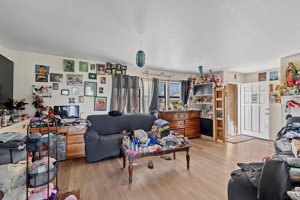 Irwin Lane Santa Rosa, CA 95401 - Photo 25 of 35 a living room with furniture and a book shelf