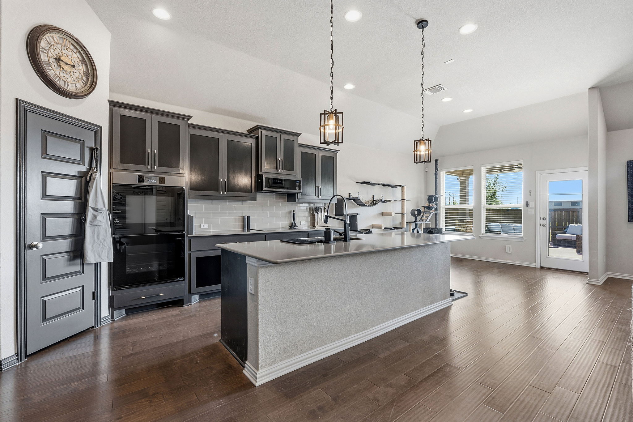 12616 Twisted Root Drive Manchaca, TX 78652 - Photo 10 of 36 The kitchen is designed for gathering with a spacious dining area and bar seating along the island.