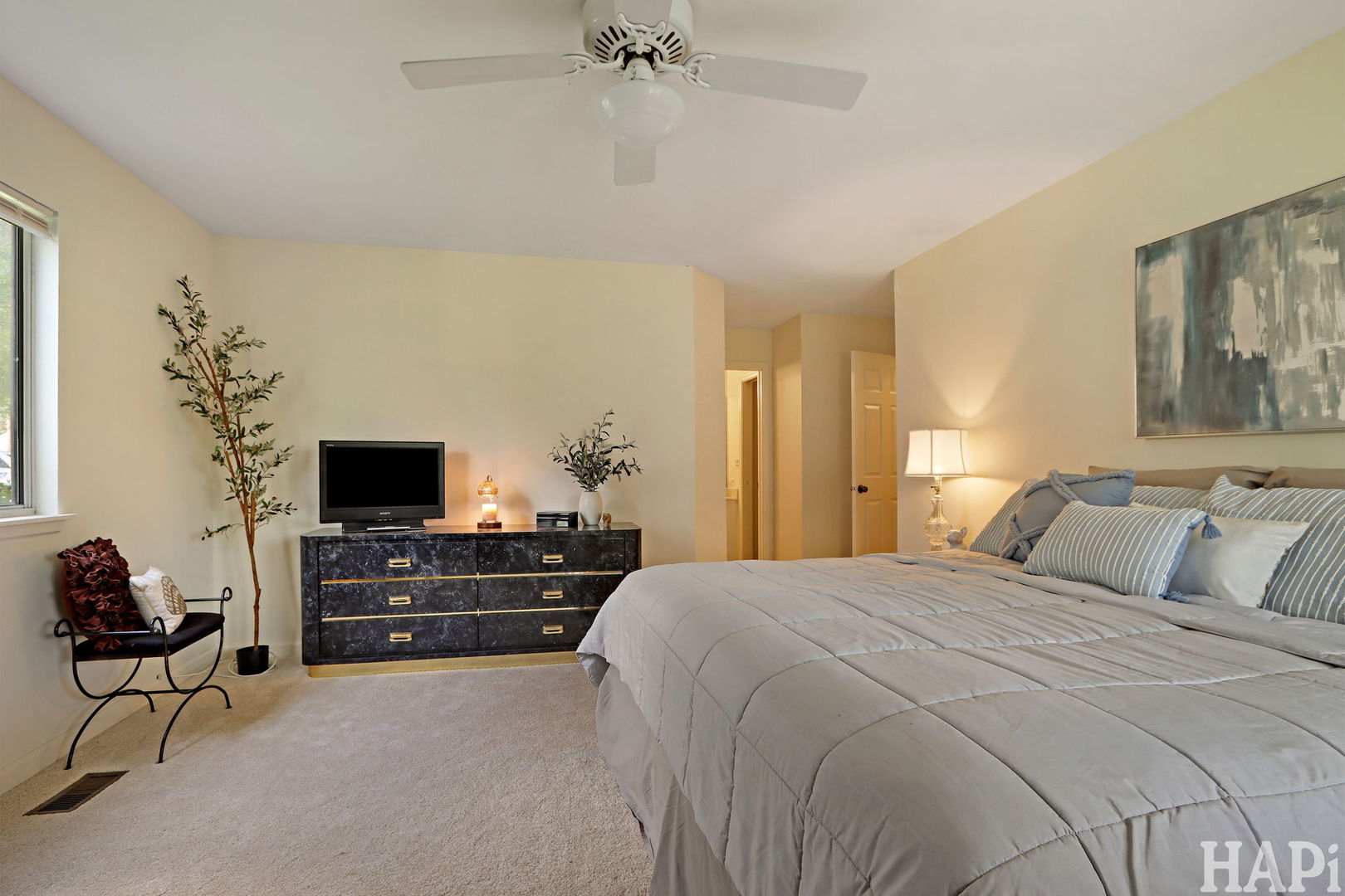 1402 Aldgate Court, Unit D1 Wheeling, IL 60090 - Photo 15 of 25 a bedroom with a bed and furniture