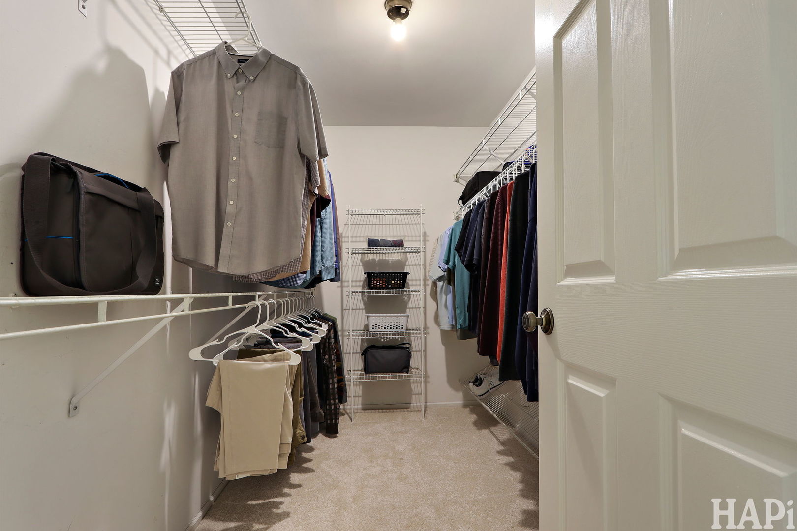 1402 Aldgate Court, Unit D1 Wheeling, IL 60090 - Photo 18 of 25 a view of walk in closet