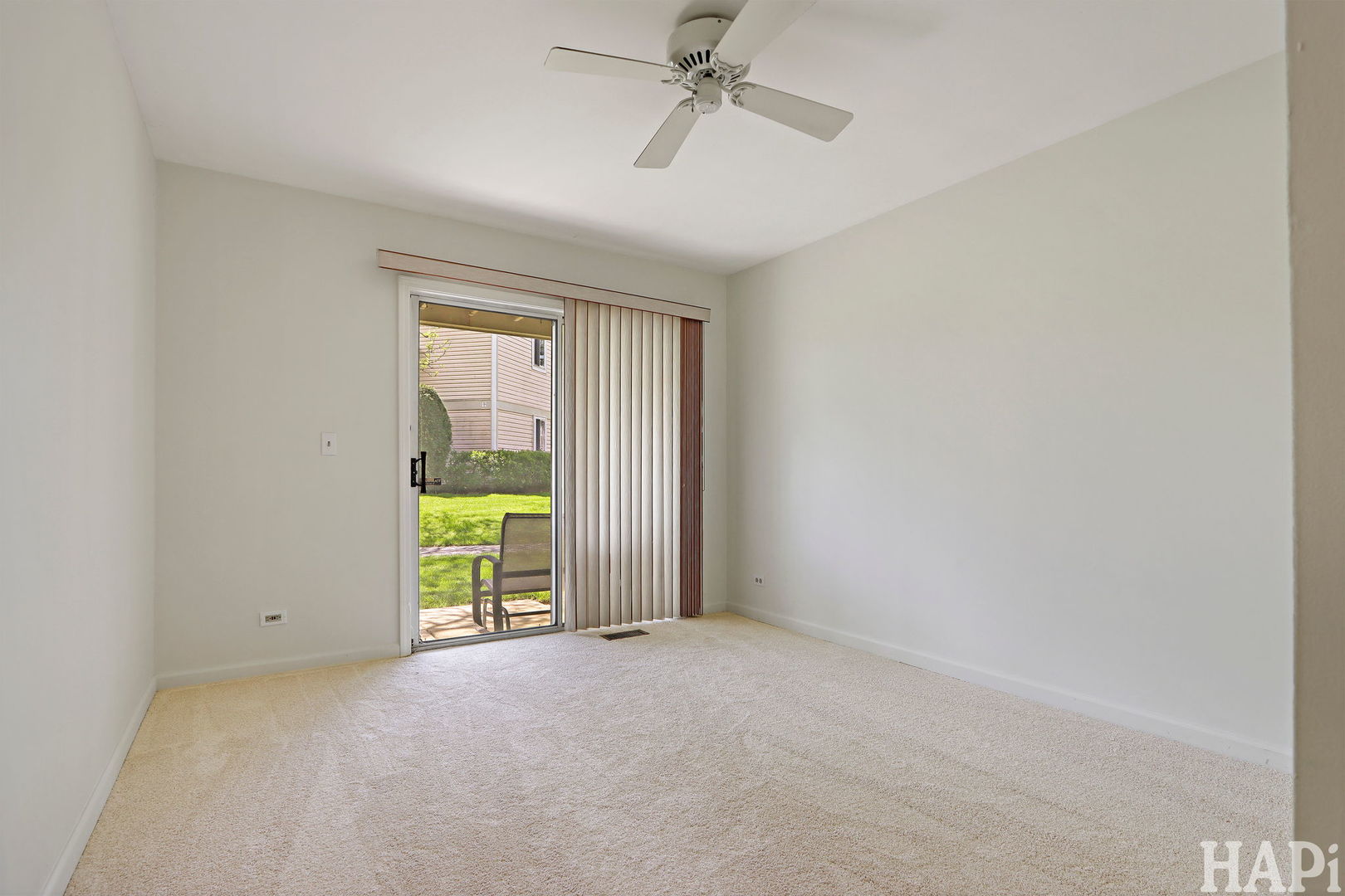 1402 Aldgate Court, Unit D1 Wheeling, IL 60090 - Photo 19 of 25 a view of an empty room with a window