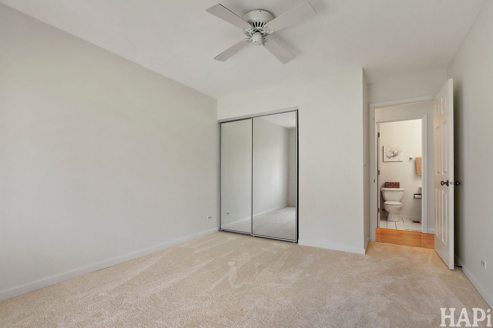 1402 Aldgate Court, Unit D1 Wheeling, IL 60090 - Photo 20 of 25 an empty room with a bathroom