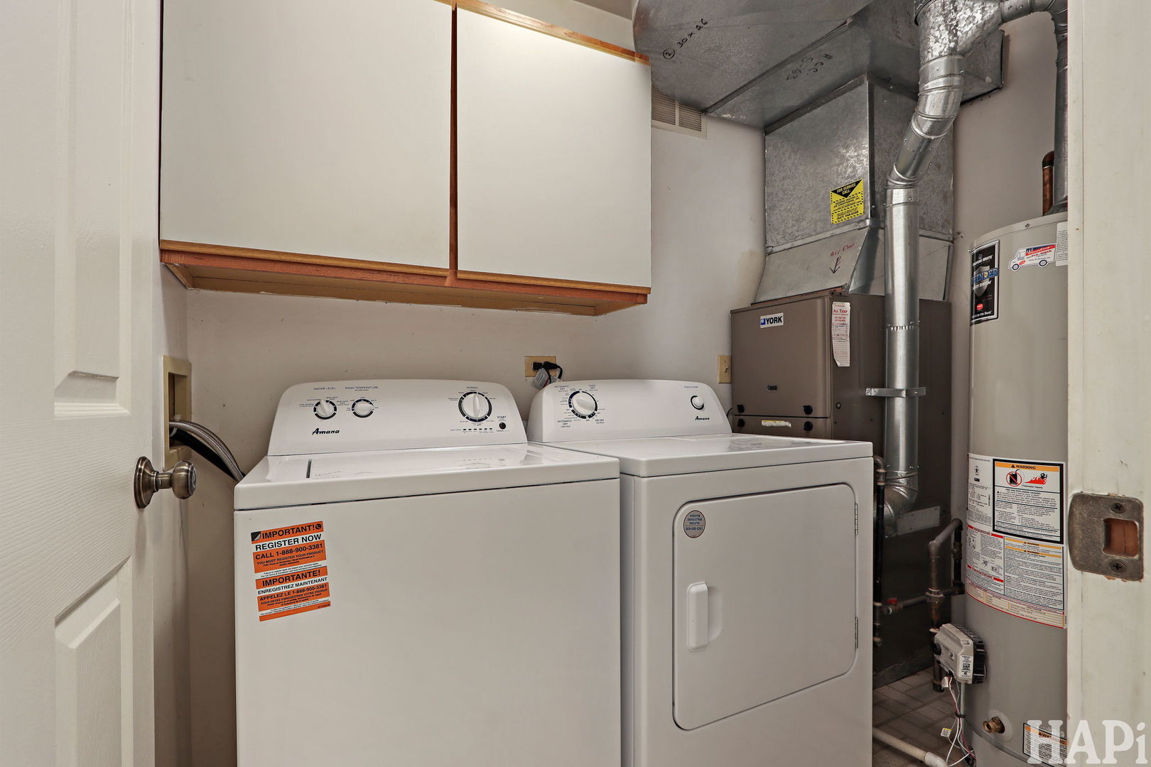 1402 Aldgate Court, Unit D1 Wheeling, IL 60090 - Photo 21 of 25 a utility room with dryer and washer