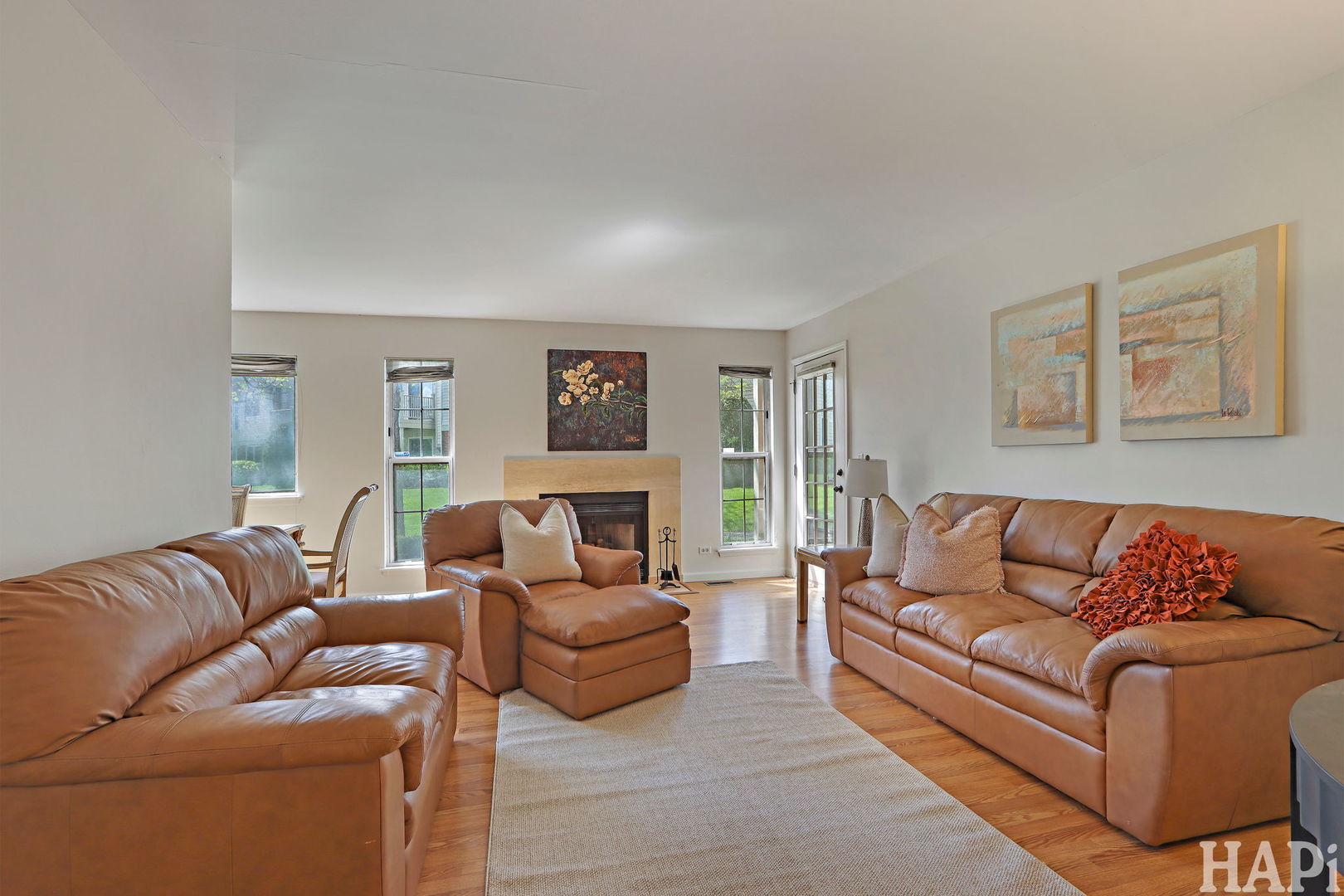 1402 Aldgate Court, Unit D1 Wheeling, IL 60090 - Photo 6 of 25 a living room with furniture and a couch