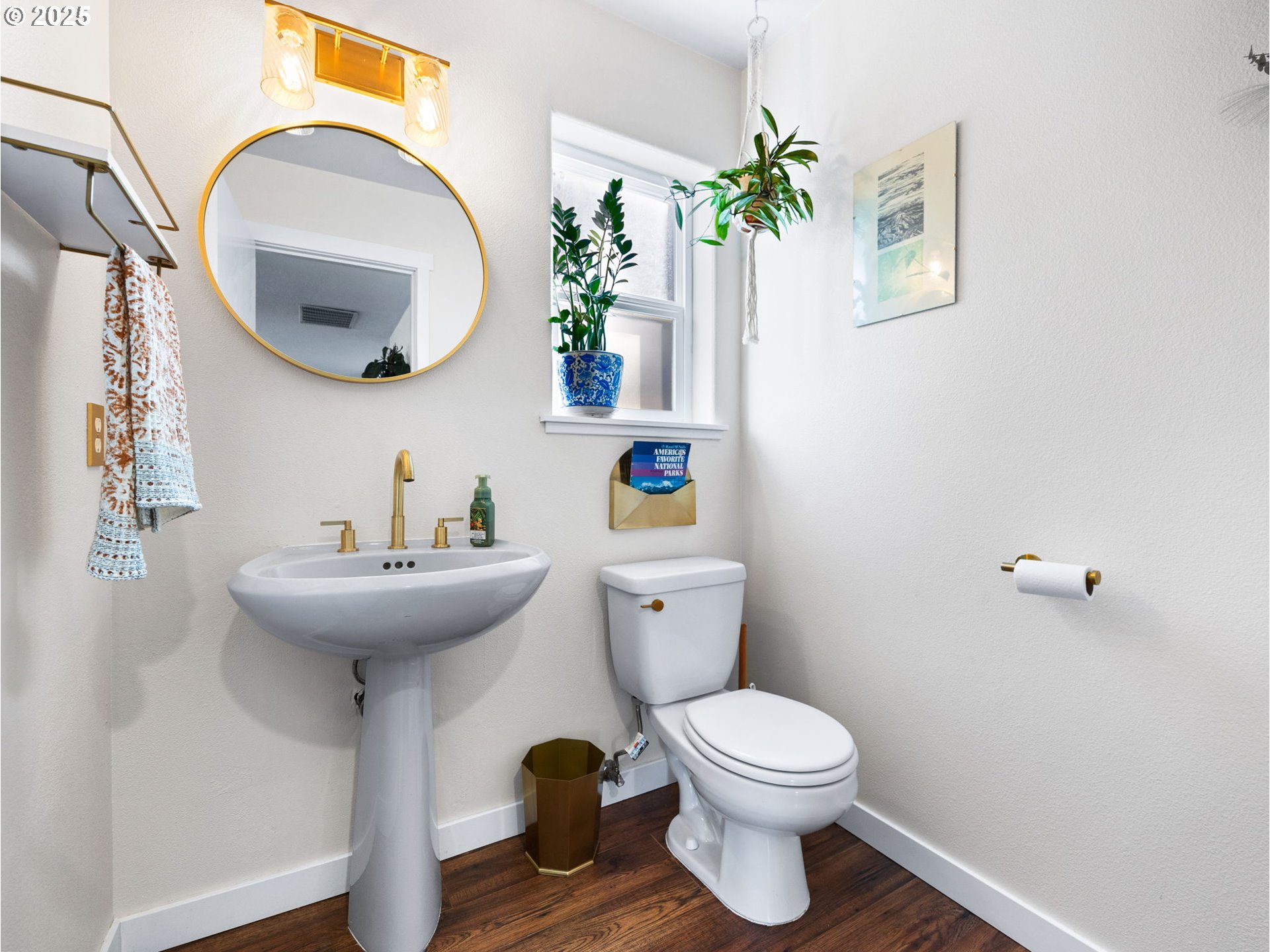 18254 Myra Court Sandy, OR 97055 - Photo 13 of 42 a bathroom with a toilet sink and mirror