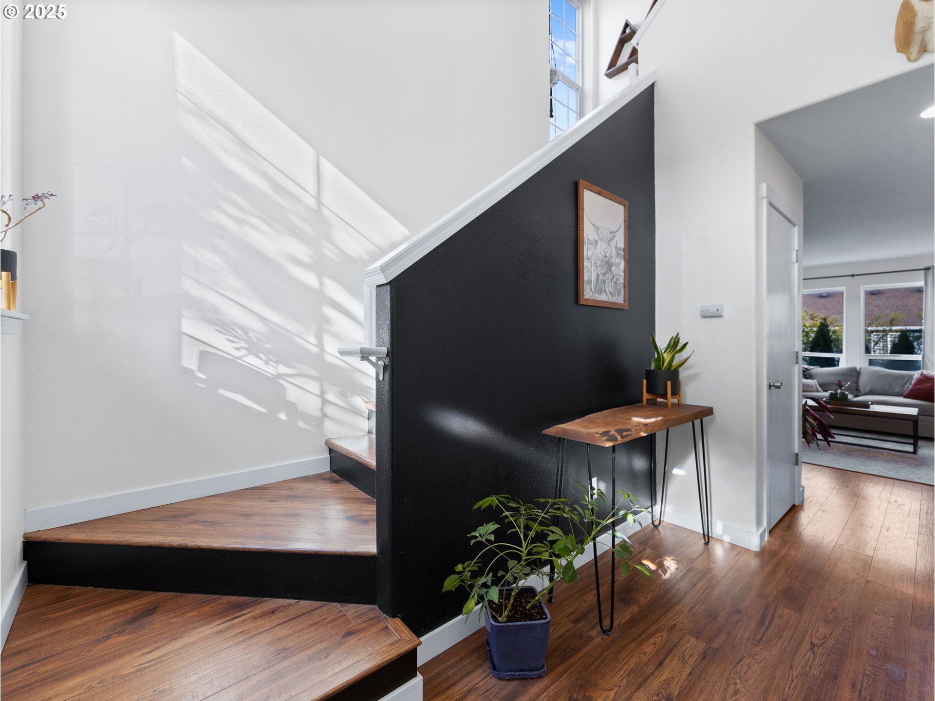 18254 Myra Court Sandy, OR 97055 - Photo 14 of 42 a room with furniture and a potted plant