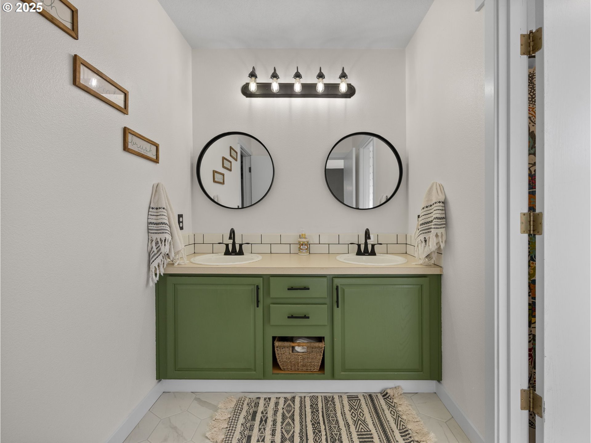 18254 Myra Court Sandy, OR 97055 - Photo 28 of 42 a bathroom with a sink and a mirror