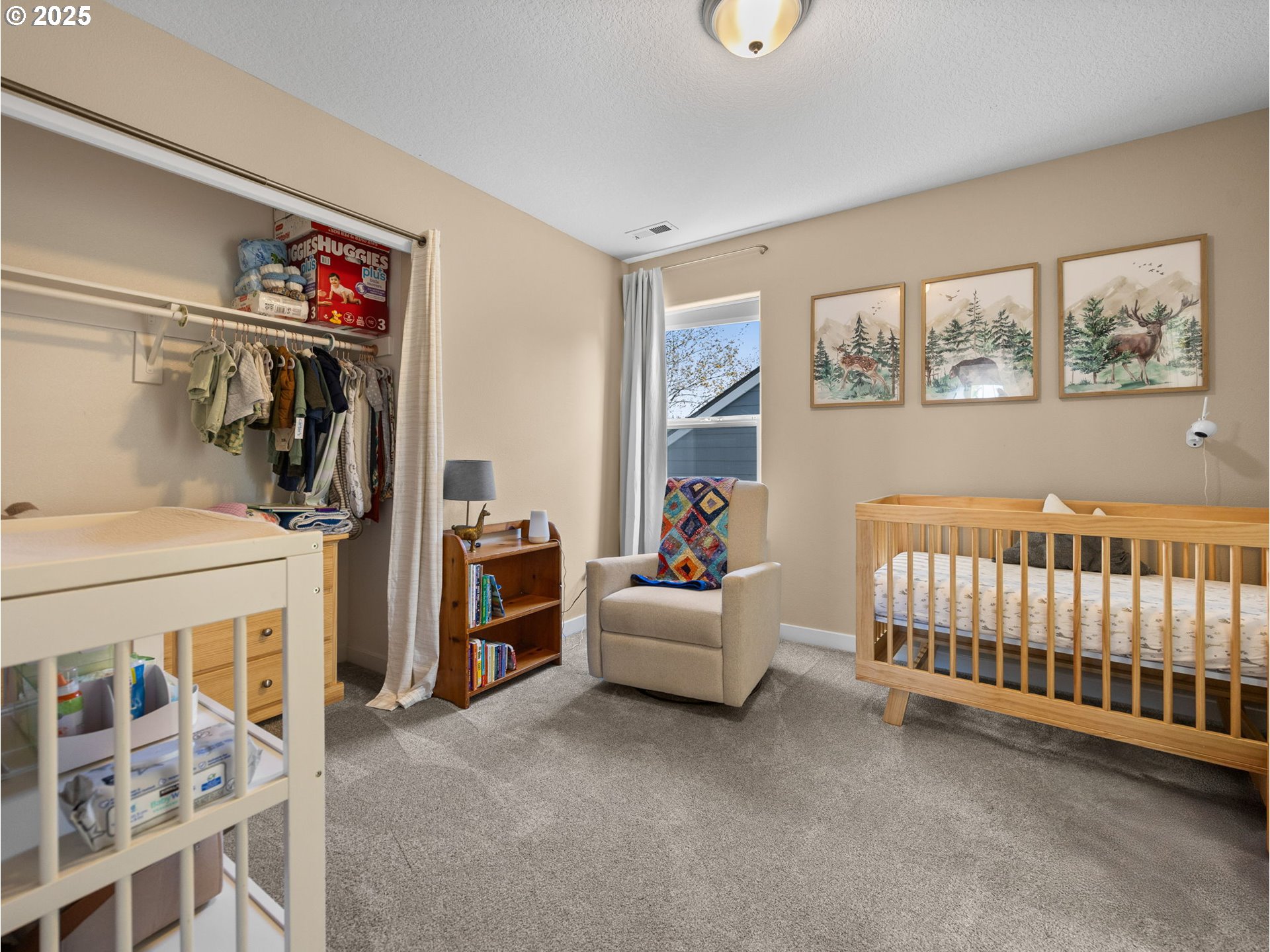 18254 Myra Court Sandy, OR 97055 - Photo 31 of 42 a bedroom with furniture and a window