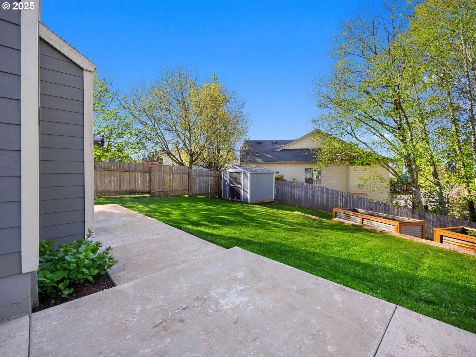 18254 Myra Court Sandy, OR 97055 - Photo 34 of 42 a view of a house with a yard
