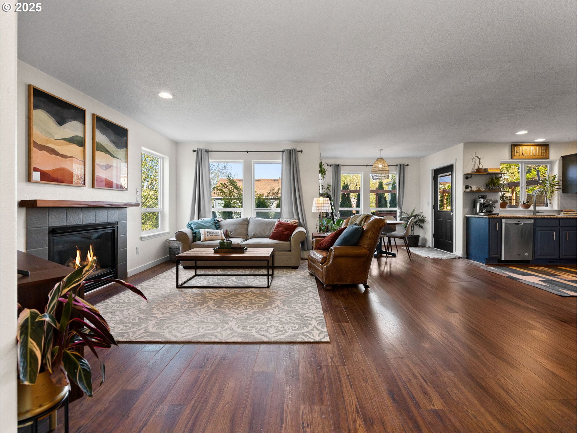18254 Myra Court Sandy, OR 97055 - Photo 6 of 42 a living room with furniture and a fireplace
