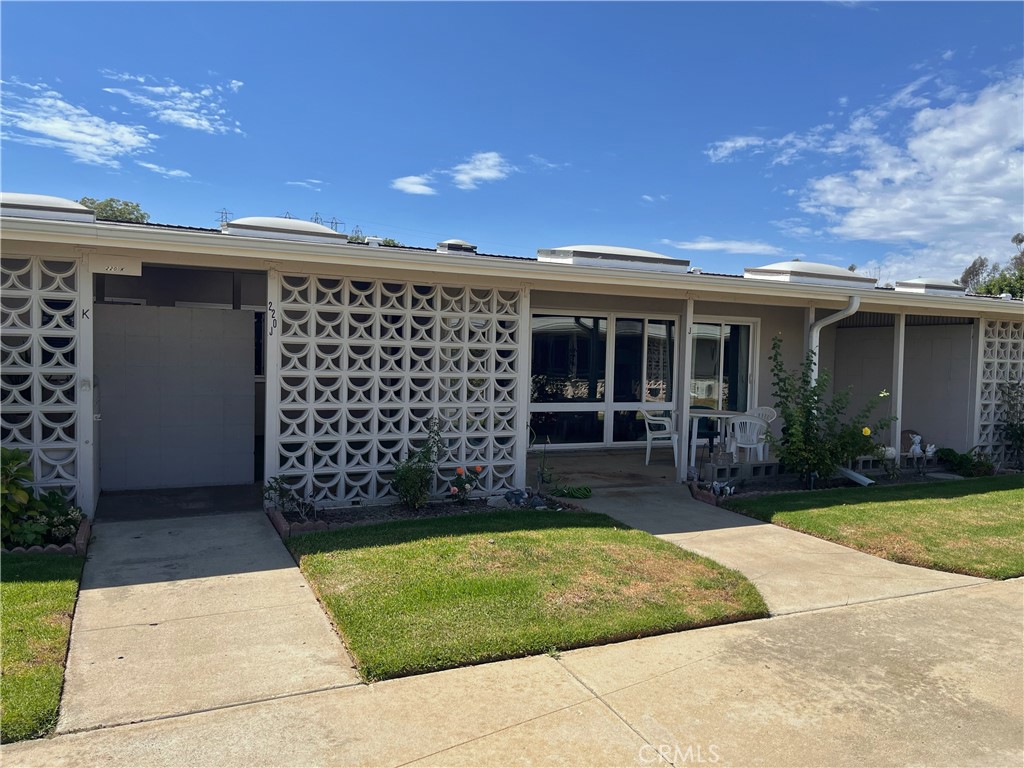 1075 Brookline Road Seal Beach, CA 90740 - Photo 2 of 13 a house view with a garden space