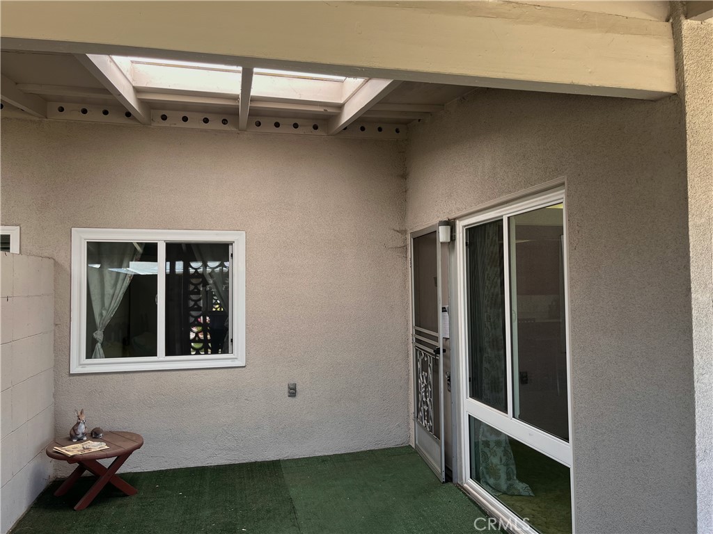 1075 Brookline Road Seal Beach, CA 90740 - Photo 4 of 13 a house that has a window in it