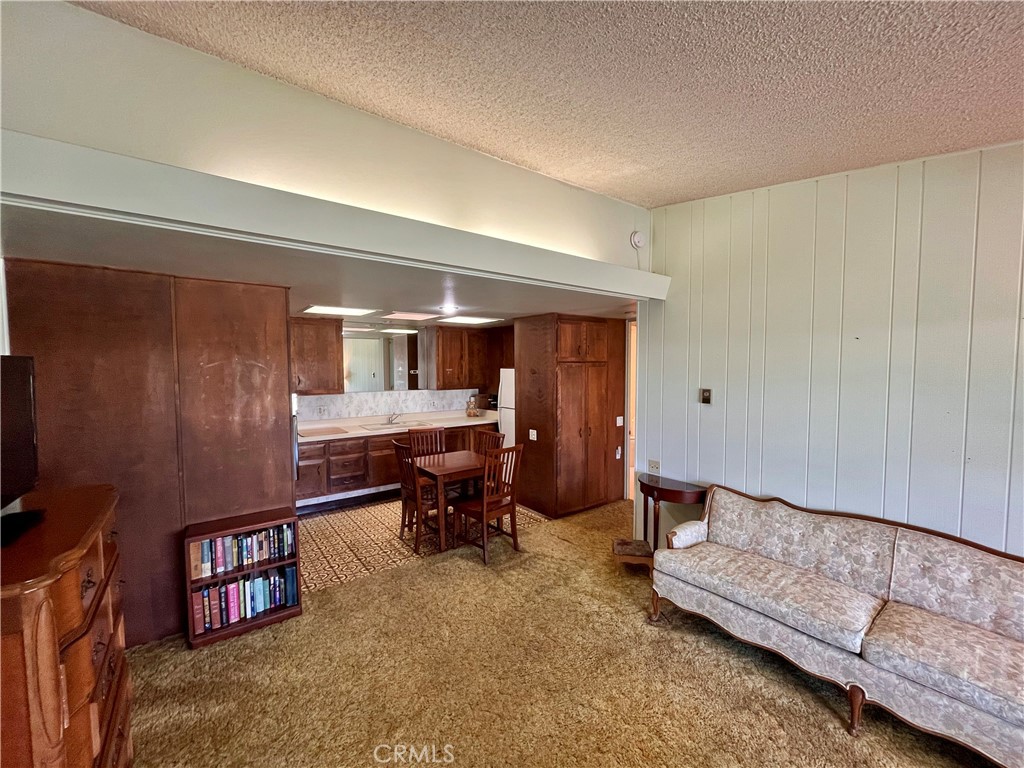 1075 Brookline Road Seal Beach, CA 90740 - Photo 6 of 13 a bedroom with furniture and a air conditioner vent