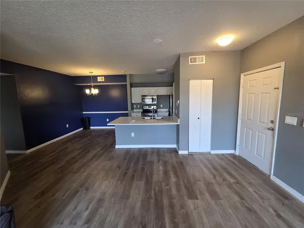 a view of a livingroom with a furniture