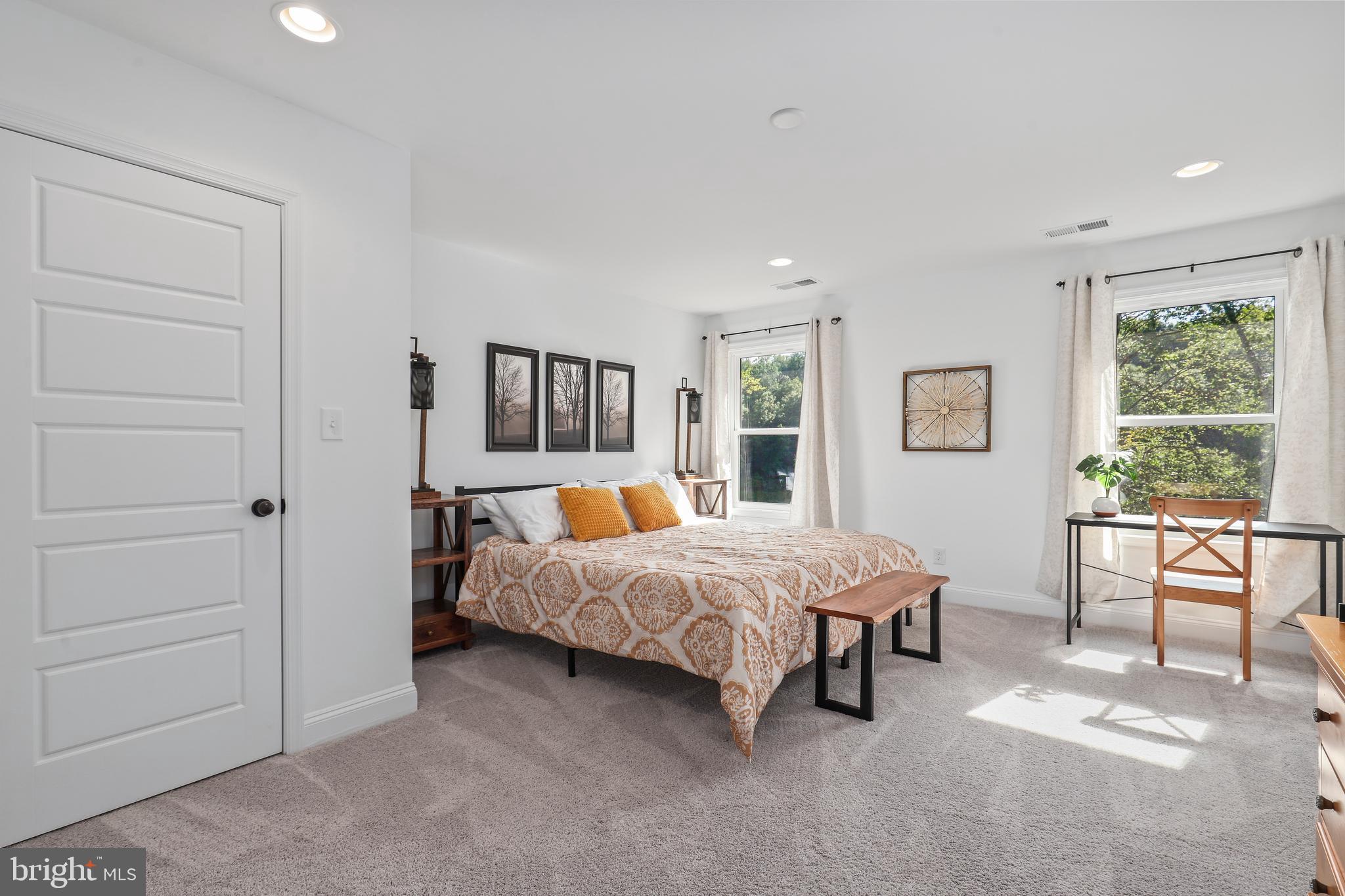 225 Raven Road Bumpass, VA 23024 - Photo 36 of 46 a bed room with a bed and furniture