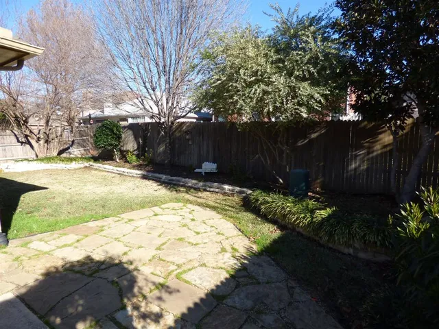 a view of backyard of house