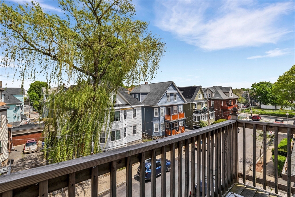 33 Wolcott Street, Unit 3 Boston, MA 02121 - Photo 8 of 8 a view of a street from a balcony