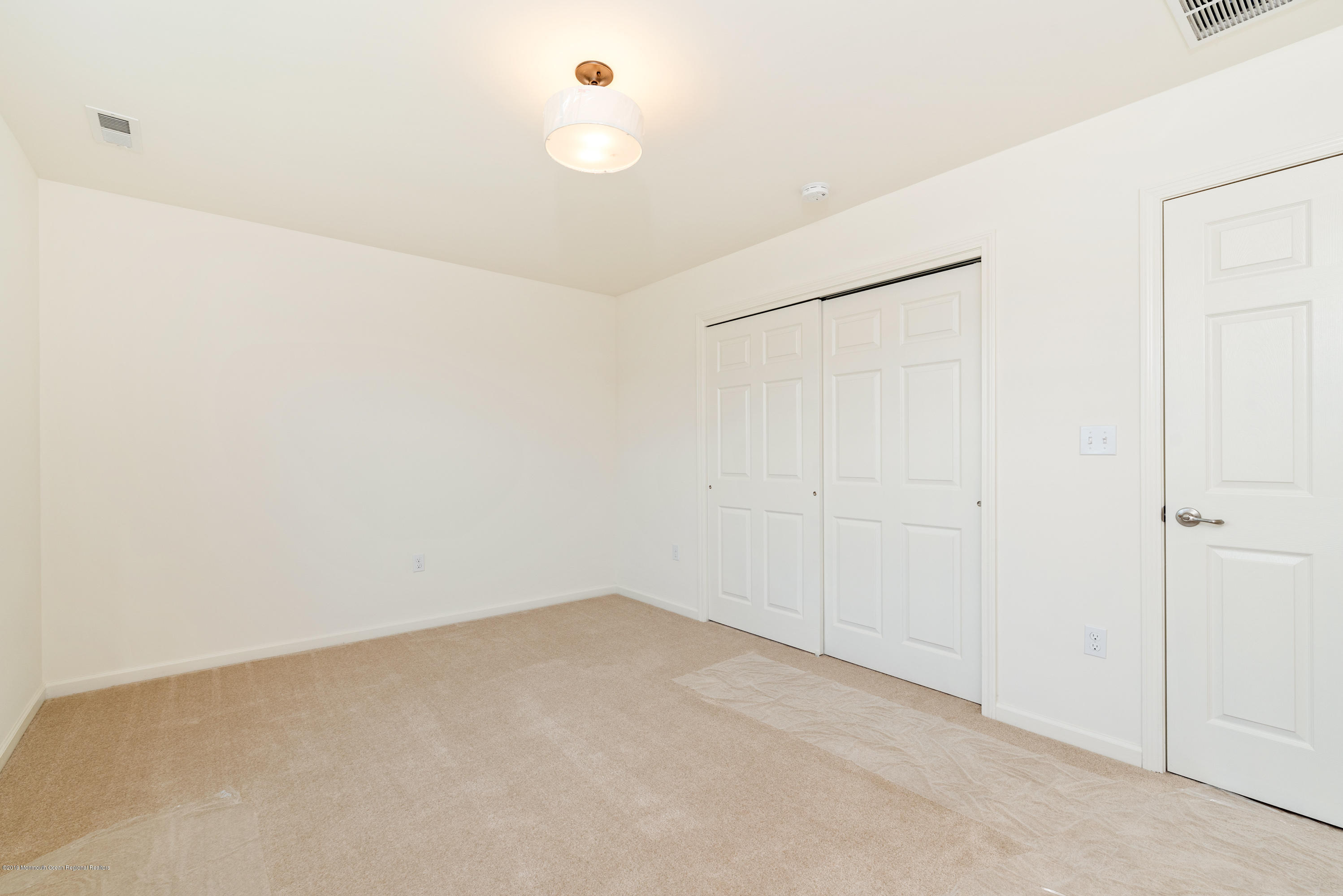 3 Bellagio Road Jackson, NJ 08527 - Photo 30 of 44 a view of an empty room