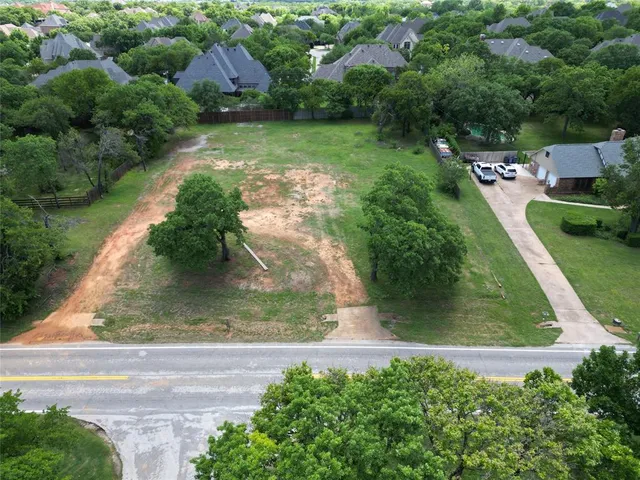an aerial view of residential house with outdoor space