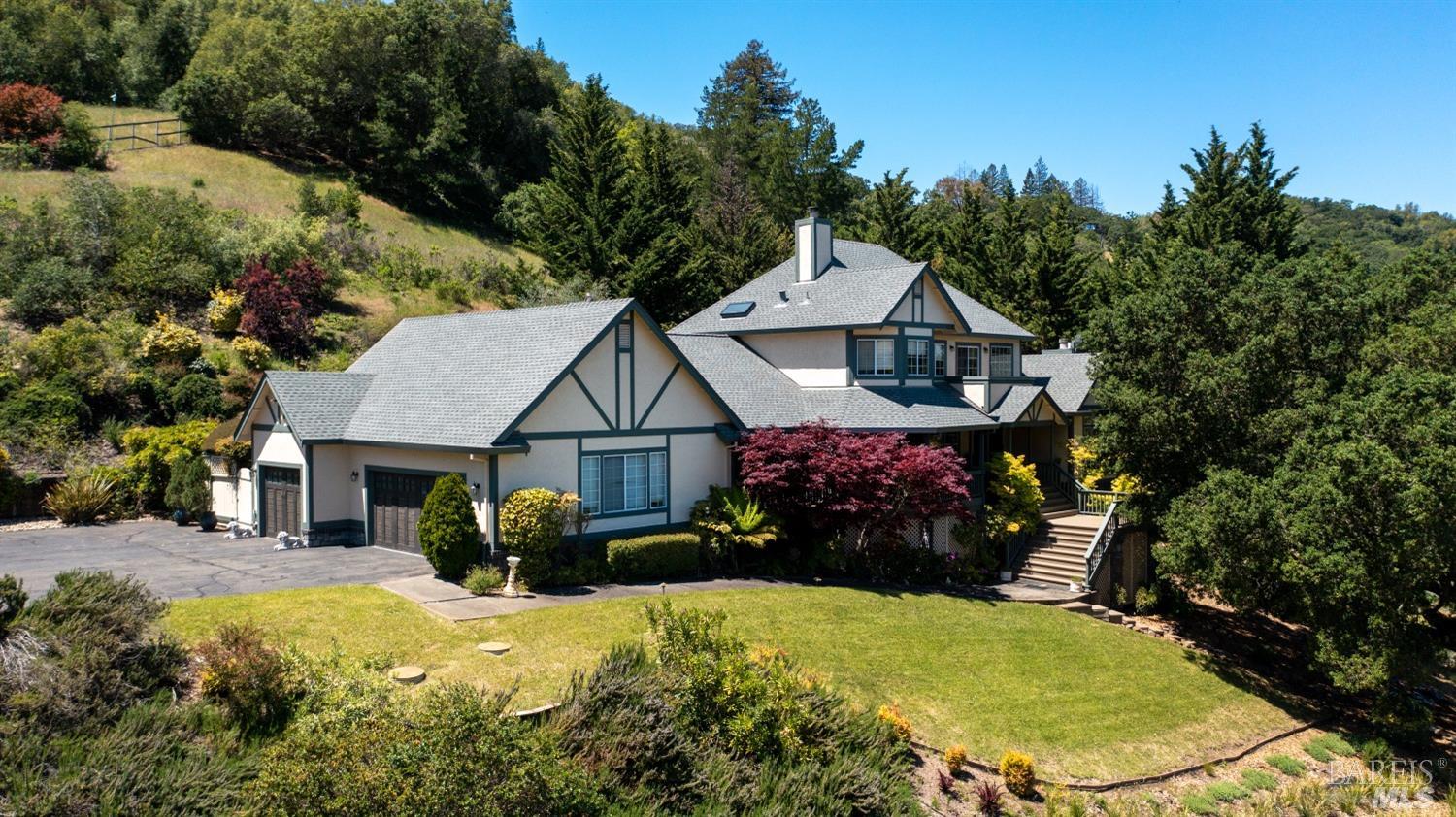 4632 Bennett Valley Road Santa Rosa, CA 95404 - Photo 1 of 1 a front view of a house with garden