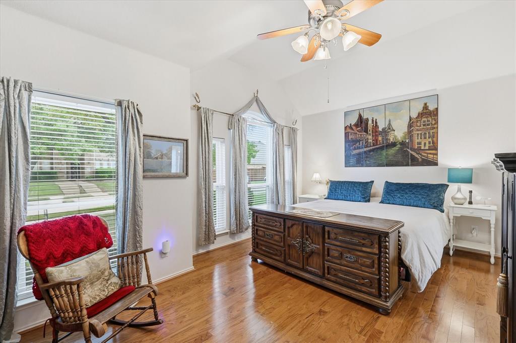 8409 Sequoia Way Fort Worth, TX 76137 - Photo 21 of 40 a spacious bedroom with a bed and window