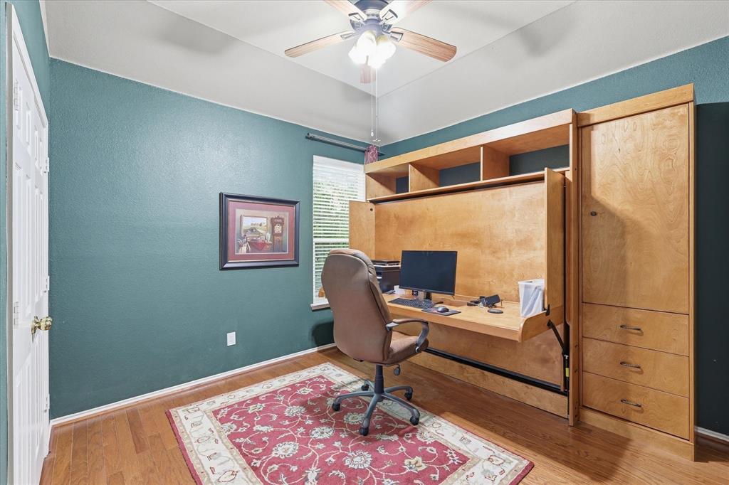 8409 Sequoia Way Fort Worth, TX 76137 - Photo 28 of 40 a work room with furniture and a rug