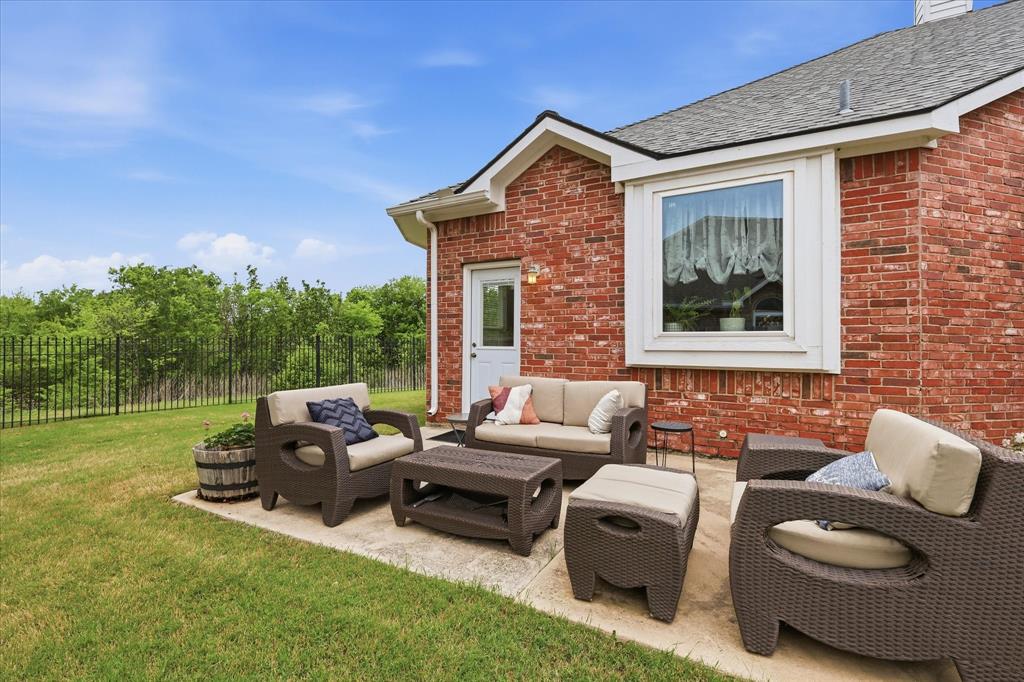8409 Sequoia Way Fort Worth, TX 76137 - Photo 33 of 40 a outdoor living space with furniture and garden view