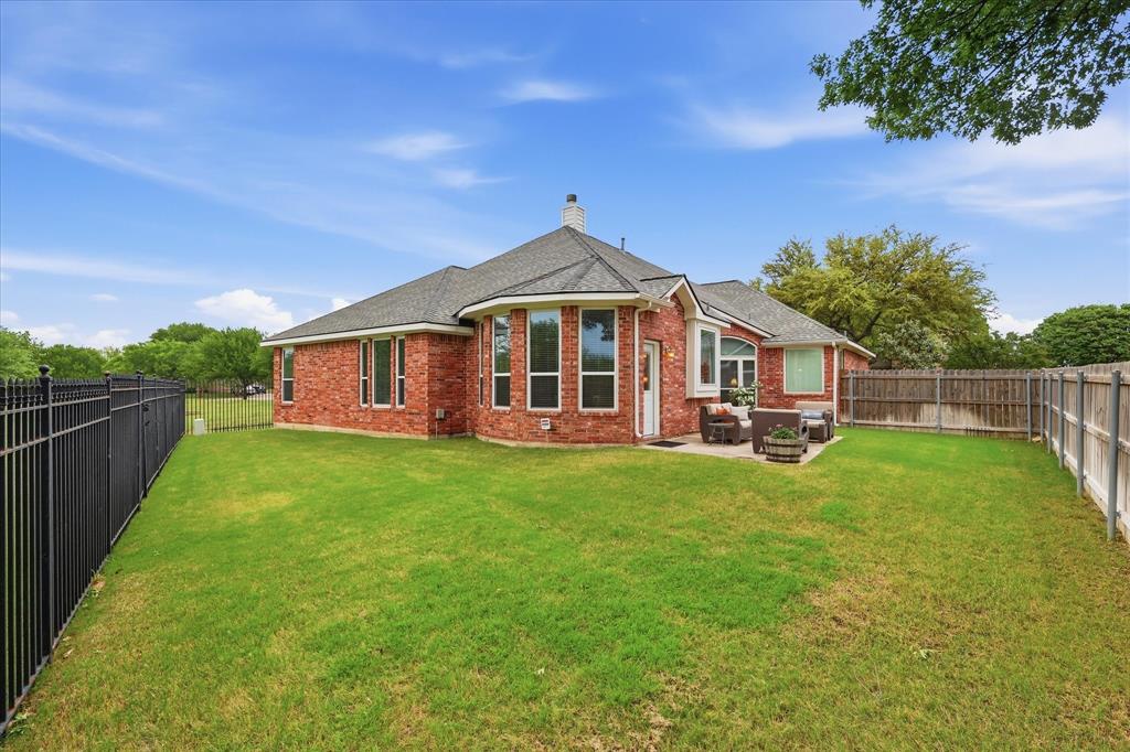 8409 Sequoia Way Fort Worth, TX 76137 - Photo 34 of 40 a view of a house with backyard