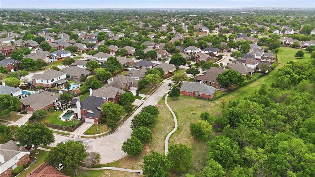 8409 Sequoia Way Fort Worth, TX 76137 - Photo 37 of 40 an aerial view of residential houses with outdoor space and trees
