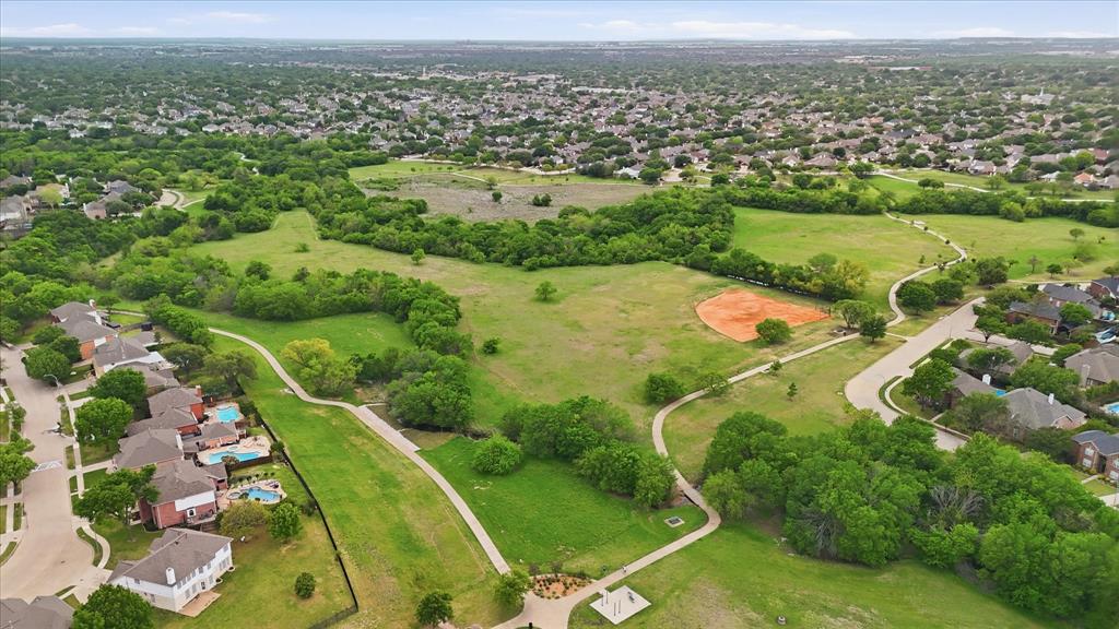 8409 Sequoia Way Fort Worth, TX 76137 - Photo 38 of 40 an aerial view of residential houses with outdoor space and trees