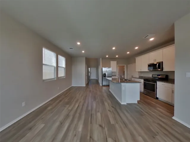 a living room with furniture and window