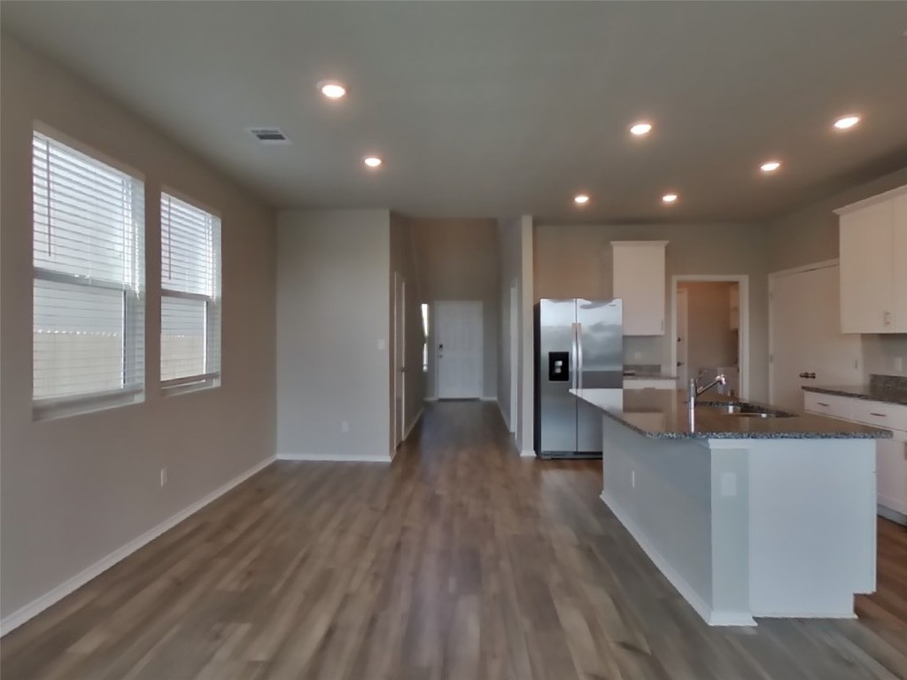 3600 Catlett Crk Road Georgetown, TX 78626 - Photo 3 of 28 a view of a kitchen with cabinets stainless steel appliances and a window