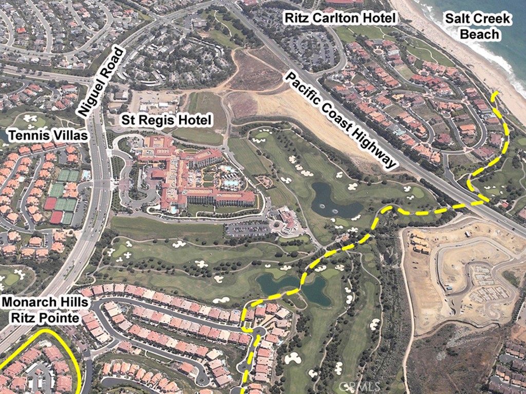 4 Corniche Drive, Unit B Dana Point, CA 92629 - Photo 23 of 41 a sign that is on a brick wall